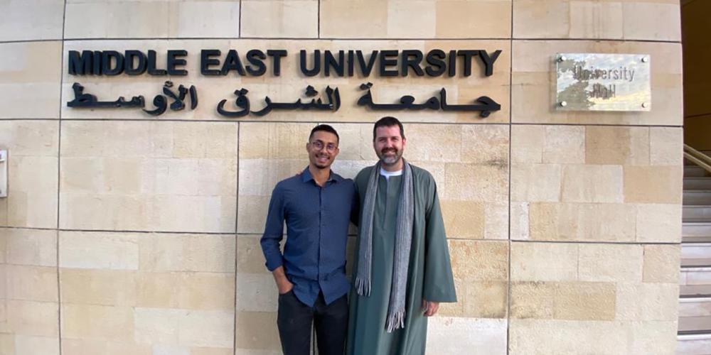 Ruan Oliveira, left, a volunteer teacher at the Adventist Learning Center, posing with Brian Manley, a teacher at Middle East University, after being reunited at the university in Beirut, Lebanon. Photo: MENA