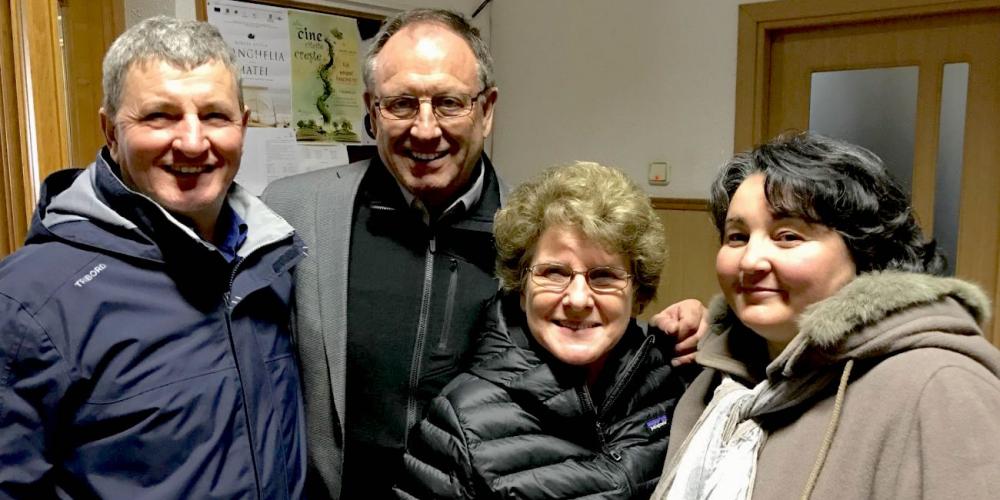 Ilie, left, and his wife, Lydia, visiting with AWR president Duane McKey and his wife, Kathy, in Pitesti, Romania. (Courtesy of Duane McKey)