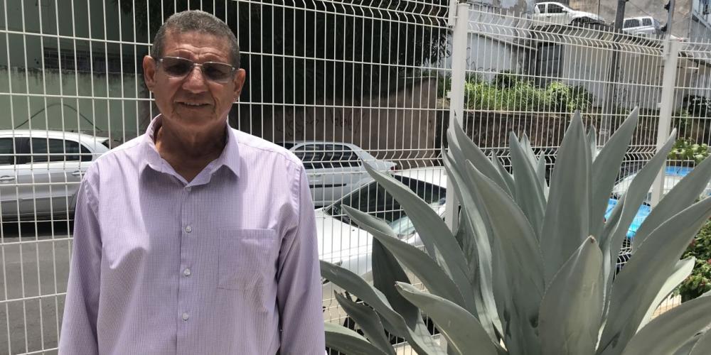 Carlos Alberto de Souza, 60, was baptized in September 2017, seven months after Mother. His daughter Beatriz wept with joy as she saw her father coming out of the water. (Andrew McChesney / Adventist Mission)