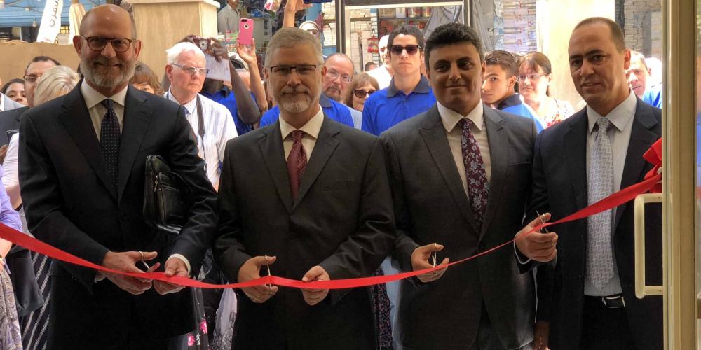 Seventh-day Adventist Church leaders cutting the red ribbon at the inauguration of the Ramses Cultural Center in Cairo, Egypt, on July 31, 2018. From left are Ted N.C. Wilson, president of the worldwide Adventist Church; Rick McEdward, president of the Middle East and North Africa Union; Johnny N. Salib, secretary of the Egypt-Sudan Field; and Kheir Boutros, associate treasurer of the Middle East and North Africa Union. (ChanMin Chung / MENAU)