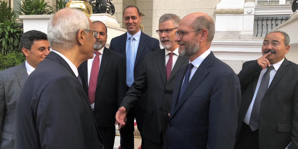 Adventist Church president Ted N.C. Wilson, second right, speaking with an Egyptian deputy foreign minister, foreground left, outside a government palace in Cairo, Egypt, after talks with Prime Minister Mostafa Madbouly on July 31, 2018. Also pictured are Youssry Youssif, right, government liaison and communication director for the Egypt-Sudan Field; Rick McEdward, third right, president of the Middle East and North Africa Union; Kheir Boutros, fourth right, associate treasurer of the Middle East and North Africa Union; Akram Khan, fifth right, treasurer of the Egypt-Sudan Field; and Johnny N. Salib, left, secretary of the Egypt-Sudan Field. (Myron Iseminger / Egypt-Sudan Field)