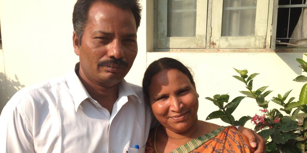 Elisha Athota embracing his wife, Solomi, on the compound of the Adventist Church’s South Andhra Section in Ibrahimpatnam in central India.