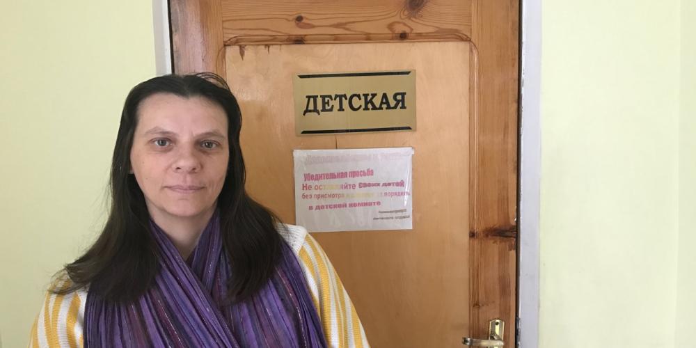 Yelena Golubeva near the door of the children's Sabbath School room at the Southern Seventh-day Adventist Church in Pavlador, Kazakhstan. (Andrew McChesney / Adventist Mission)