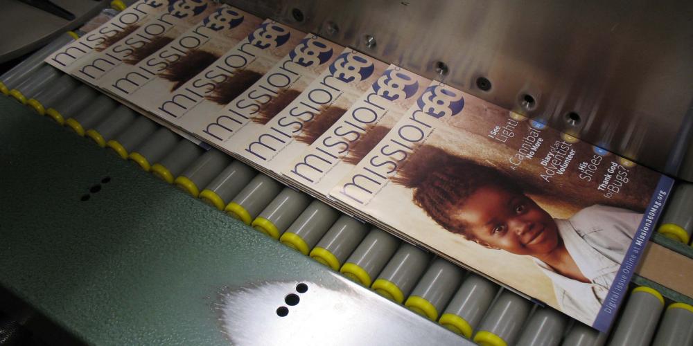 The first issue of Mission 360 magazine coming off the printing press 10 years ago in 2013. (Donna Rodill / Adventist Mission)