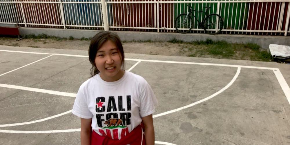 Urna Uuganbayar, 15, standing in the basketball court at Tusgal School in Ulaanbaatar, Mongolia. (Urna Uuganbayar)