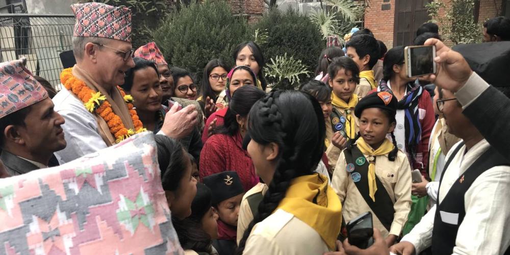 Adventist Church president Ted Wilson meeting Pathfinders and others outside Banepa church in Kathmandu, Nepal, on Feb. 12, 2018. (Andrew McChesney / Adventist Mission)