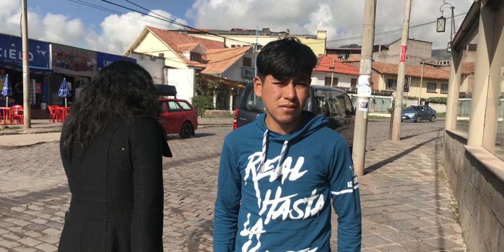 Pierurco Alcides Valdez Chicata, 15, standing on a street in Cusco, Peru. His brother was hospitalized in Cusco. (Andrew McChesney / Adventist Mission)