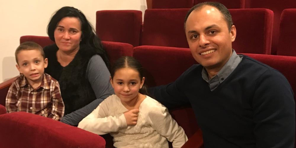Valentin Manea with his wife, Antoinette, and two children at Cuza Voda Seventh-day Adventist Church in Bucharest, Romania. (Andrew McChesney / Adventist Mission)