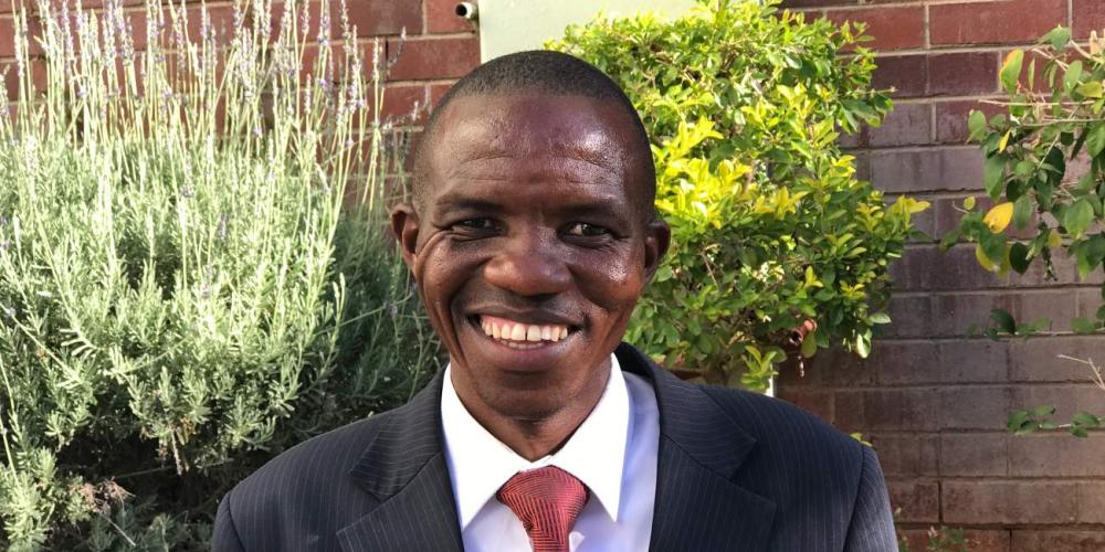 Global Mission pioneer Mkhokheli Ngwenya, pictured, preached about biblical prophets without knowing a self-proclaimed prophet was in the audience. (Andrew McChesney / Adventist Mission)