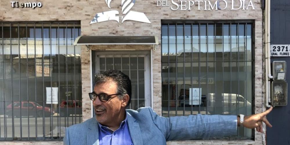 Nestor Alvaro Rivero gesturing outside Goes Seventh-day Adventist Church, which he planted in Montevideo, Uruguay. (Andrew McChesney / Adventist Mission)
