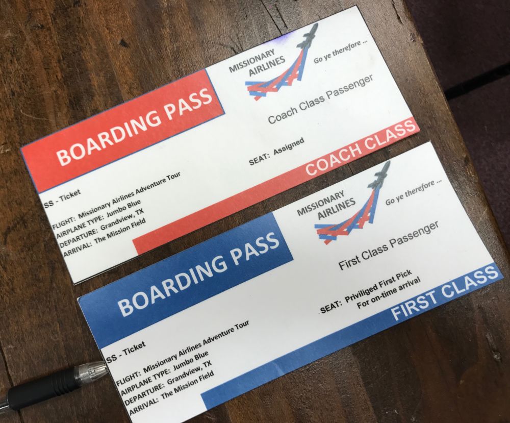 Boarding passes for first-class and economy seats.