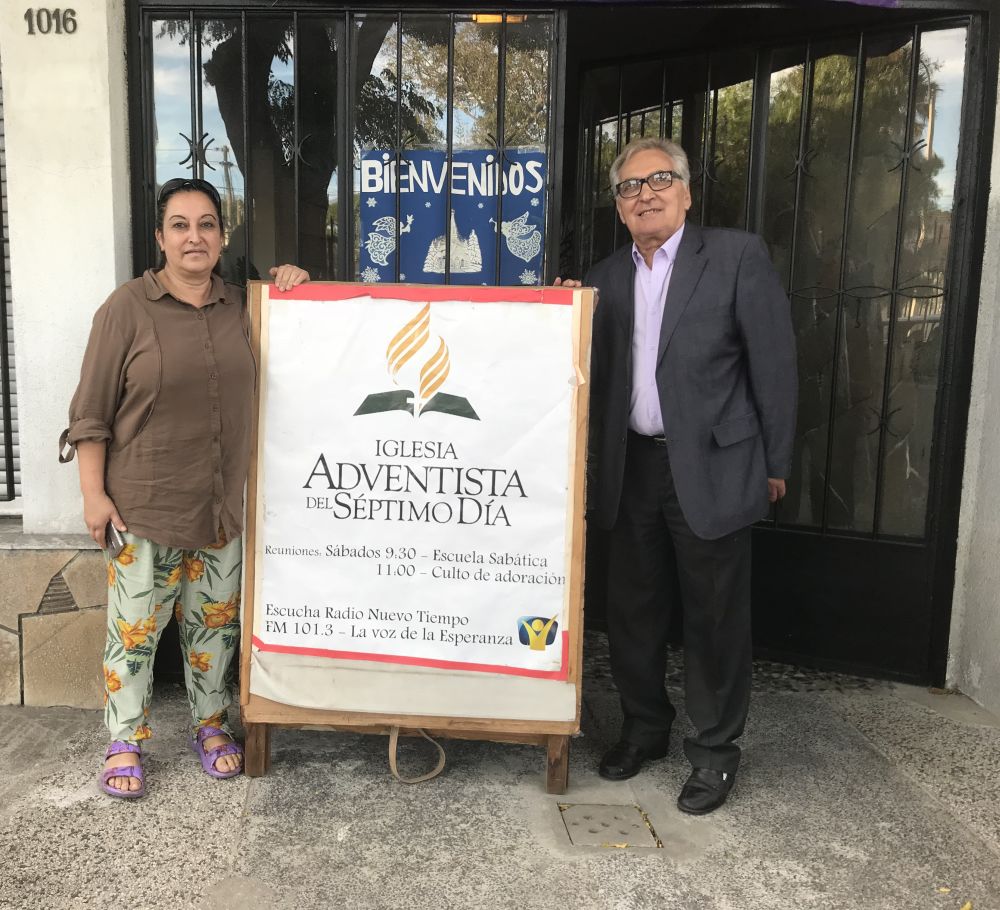 Graciela Musetti, 52, standing with Miguel Amaro Speranza, a church member who gave her Bible studies, at La Teja Seventh-day Adventist Church, funded by a 2016 Thirteenth Sabbath Offering, in Montevideo, Uruguay. (Andrew Mcchesney / Adventist Mission)