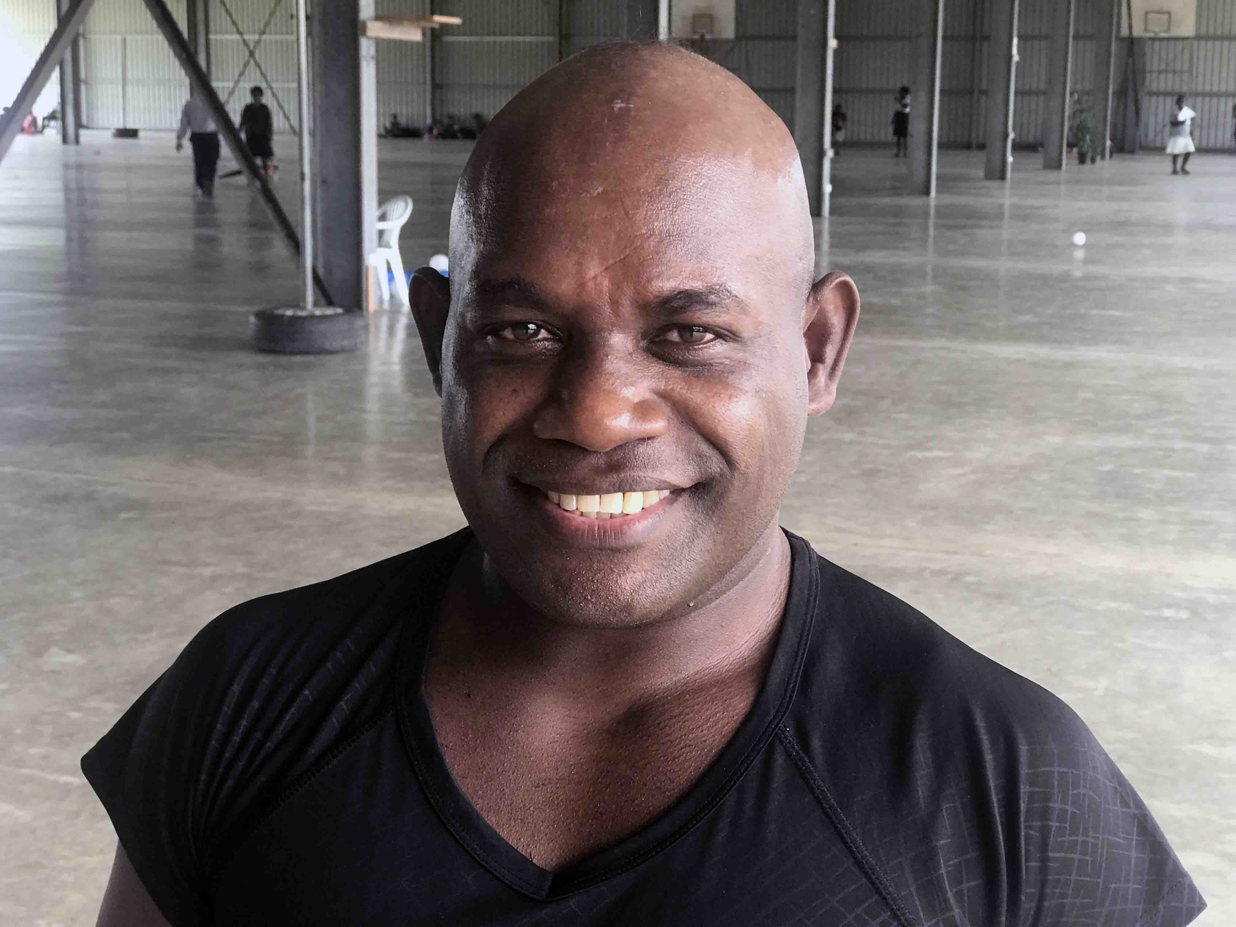 Herik Dun Siope, 46, standing inside the Maranatha auditorium where he conducts fitness classes four days a week in Solomon Islands’ capital, Honiara. (Andrew McChesney / Adventist Mission)